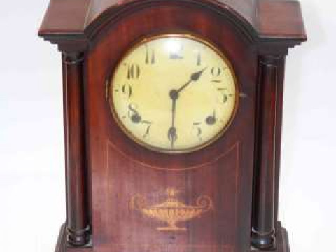 Edwardian inlaid mahogany mantel clock with columns