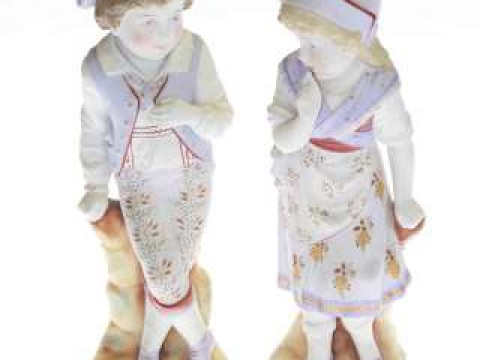 Pair late Victorian large bisque boy and girl figures