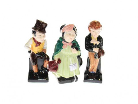 Three Royal Doulton Dickensian figures, Sairy Gamp, David Copperfield...