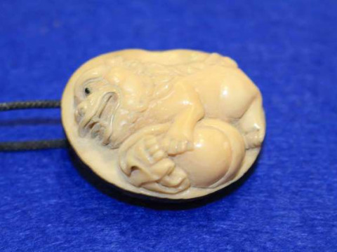 Carved carob nut