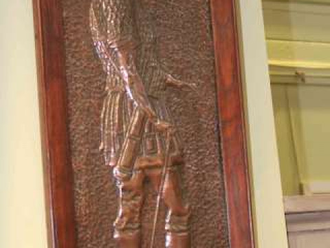 Pair of early 20th Century copper panels depicting warriors