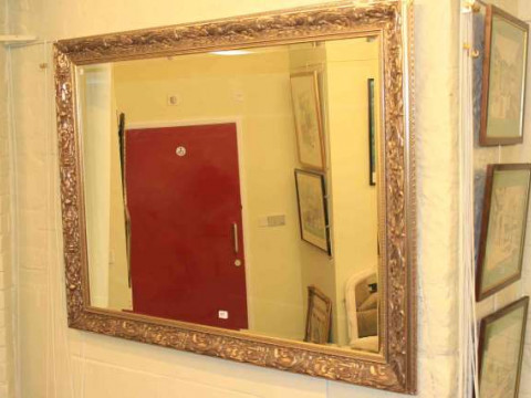Large mirror with silvered frame
