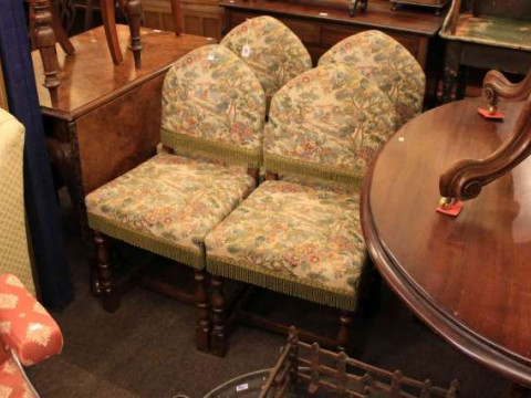 Set of four tapestry arched back dining chairs