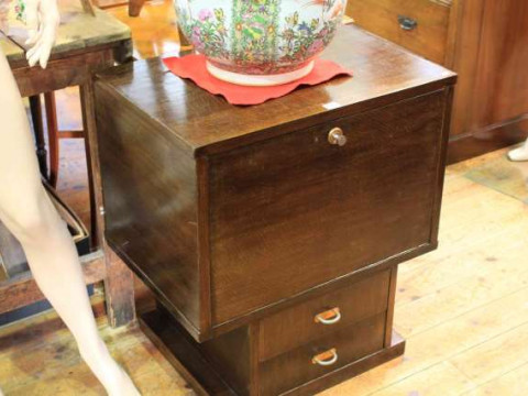 Oak Deco style cocktail cabinet having fall front above two drawers