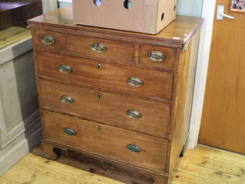 Georgian mahogany chest of three short above three long drawers on shaped...