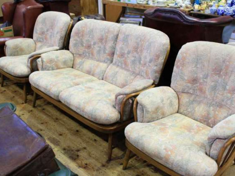 Ercol Windsor three piece lounge suite in floral patterned fabric