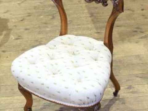 Victorian walnut and deep buttoned open back nursing chair bearing label...
