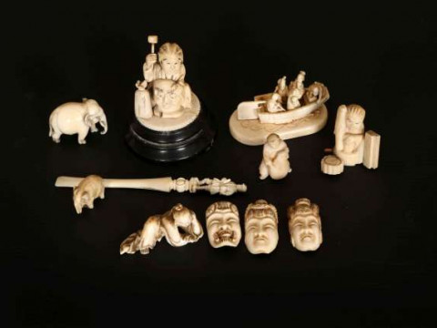 A GROUP OF IVORY CARVINGS, 19th and early 20th Century, including a Japanese...