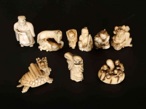A COLLECTION OF NINE JAPANESE IVORY NETSUKES, 19th/early 20th Century,...