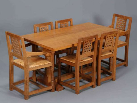 ROBERT THOMPSON OF KILBURN, A MOUSEMAN OAK DINING SUITE, c.1970's, comprising...