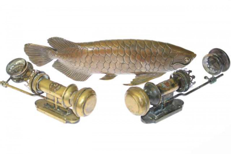 Pair of White Star Liverpool lamps and bronze carp