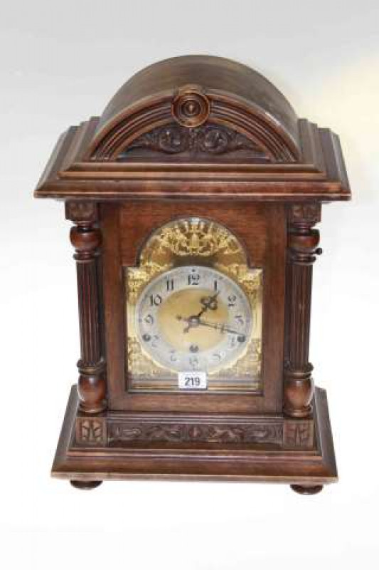 Large carved mahogany bracket clock with silvered and gilt dial