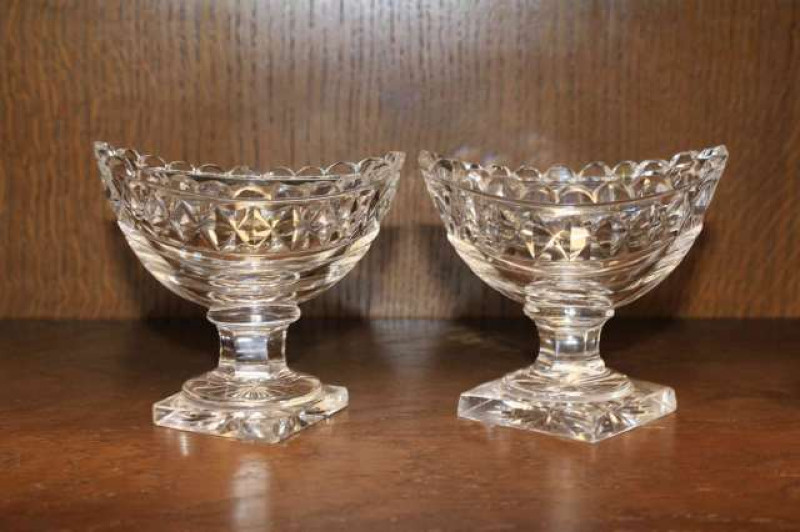 Pair of cut glass oval pedestal salt pots
