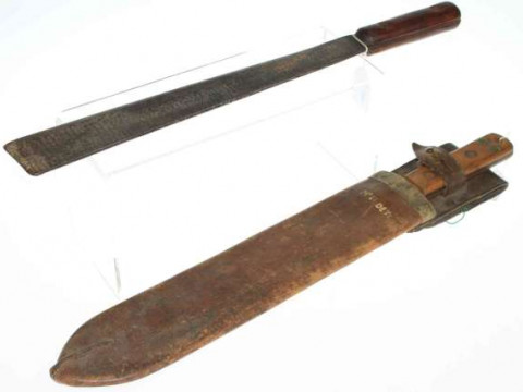 Two machetes (one with leather scabbard)
