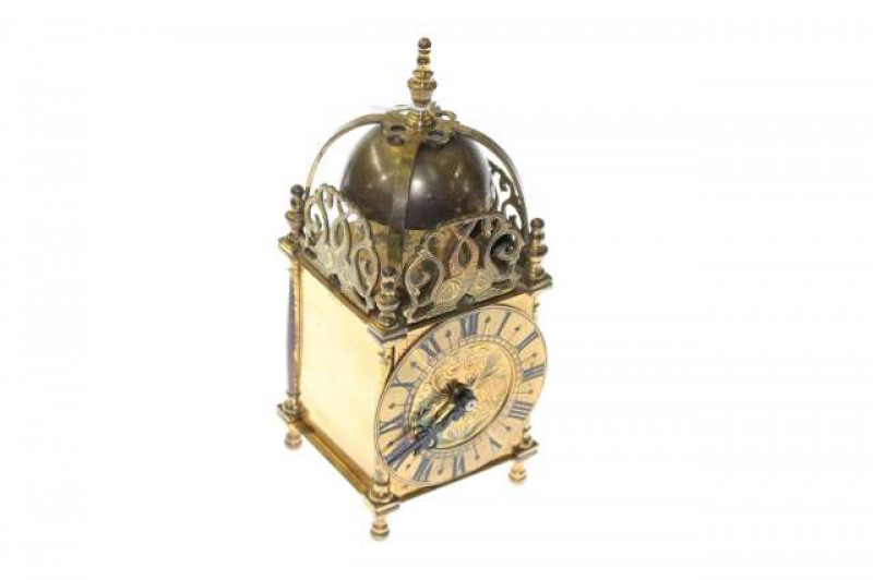 Period style mantel clock in the form of a lantern clock