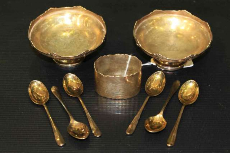 Pair of crested silver dishes, Walker & Hall, Sheffield 1928; silver napkin ring and six silver coffee spoons (9)