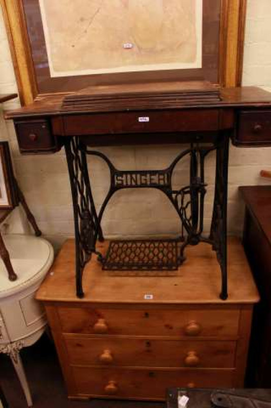 Stripped Pine three drawer chest, vintage Singer treadle sewing machine, wheelback elbow chair, rocking chair and large framed print (5)