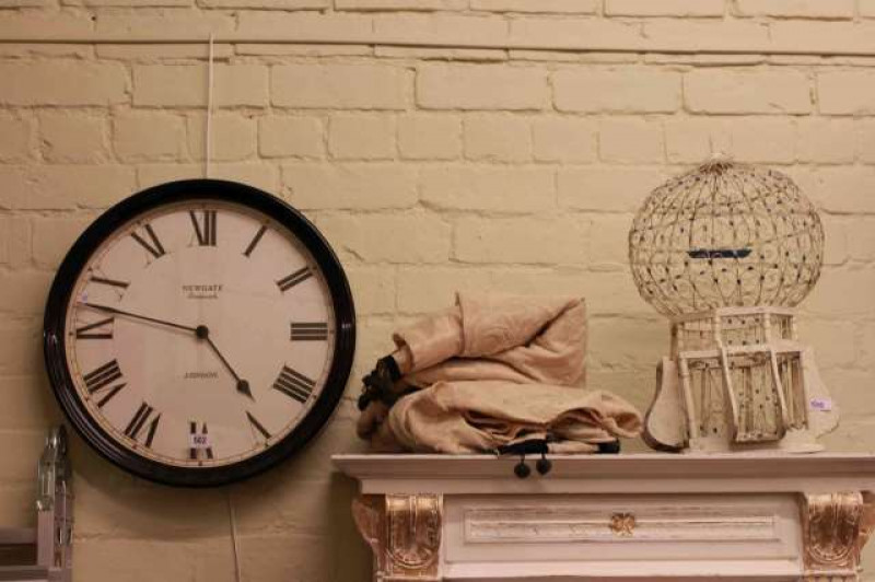 Circular wall clock, Eastern style bird cage, pair of wall mirrors, pair of plant troughs and curtains (8)