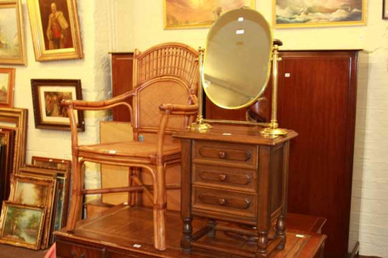 Cane elbow chair, three drawer pedestal chest, twist column plant stand and brass framed toilet mirror (4)