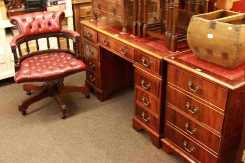 Mahogany eight drawer pedestal desk, matching two drawer filing cabinet and buttoned leather captains style swivel desk chair (3)