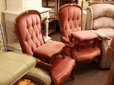 Pair of Grant International open armchairs and footstools in rose buttoned...