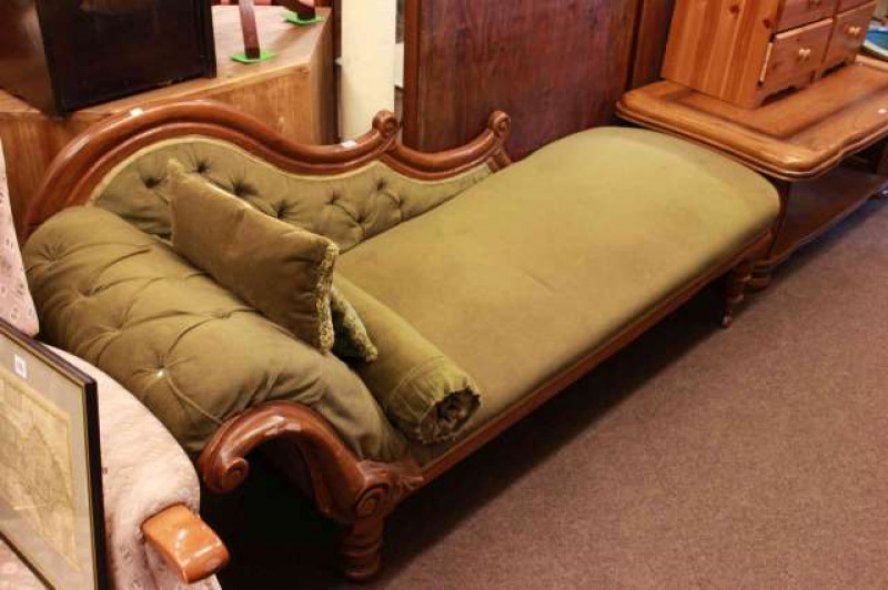 Victorian mahogany framed scroll end chaise longue in green buttoned fabric