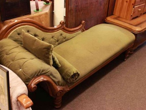 Victorian mahogany framed scroll end chaise longue in green buttoned fabric