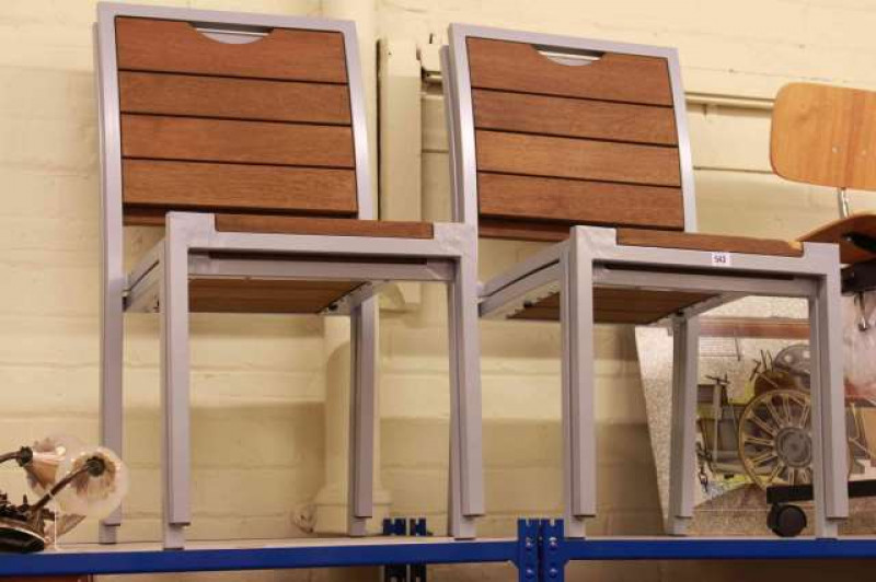 Set of four teak and metal patio chairs