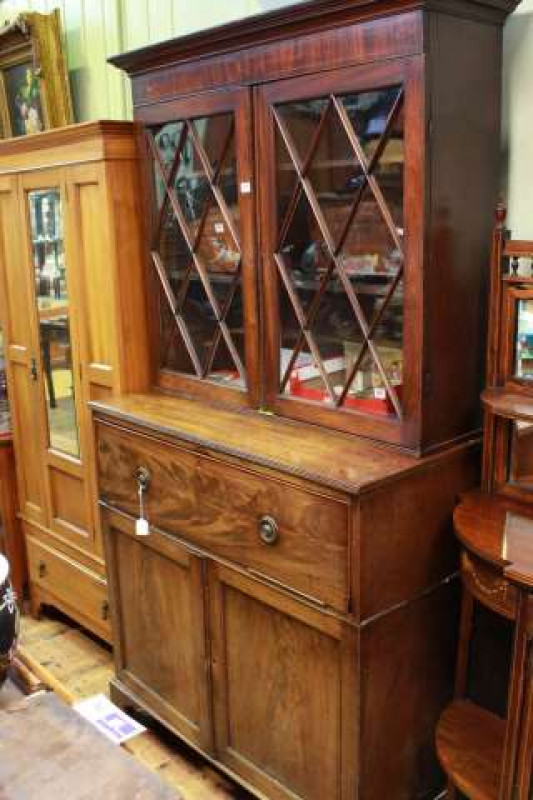 Georgian mahogany secretaire and later glazed panel door bookcase top
