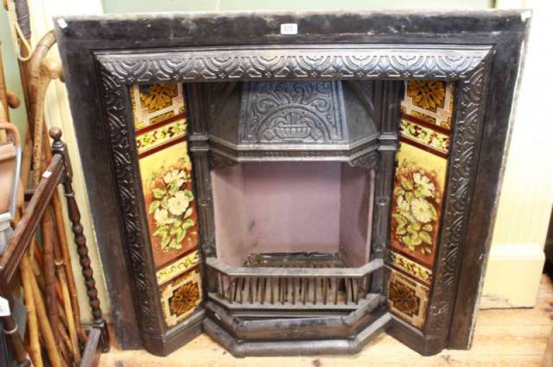 Cast and tiled fireplace and painted fire surround