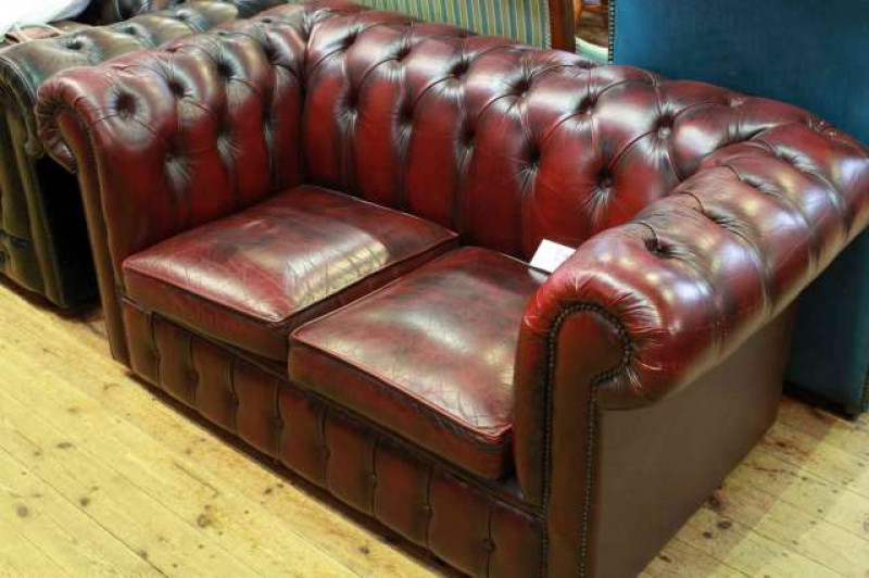 Ox Blood deep buttoned leather two seater Chesterfield settee
