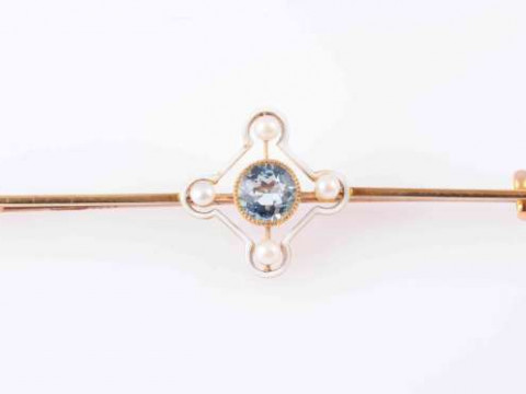 A LATE VICTORIAN AQUAMARINE, ENAMEL AND SEED PEARL BROOCH, CIRCA 1890,...