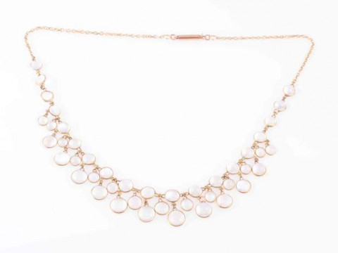 A MOONSTONE NECKLACE, CIRCA 1900-1910, the twenty five graduating round...