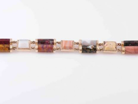 A MULTI AGATE BRACELET, CIRCA 1880, the four square cut agates of differing...