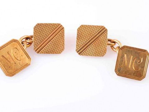 A PAIR OF 18 CARAT YELLOW GOLD CUFFLINKS, each with two square cut-cornered...