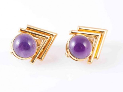 A PAIR OF AMETHYST EARRINGS, CIRCA 1950, the round cabochon cut amethyst...
