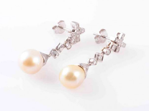 A PAIR OF CULTURED PEARL AND DIAMOND EARRINGS, CIRCA 1920, the cultured...