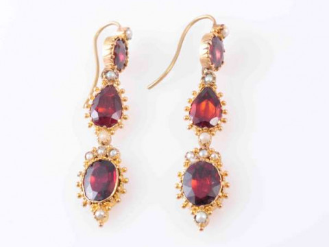 A PAIR OF GARNET AND SEED PEARL EARRINGS, CIRCA 1880, the three oval,...