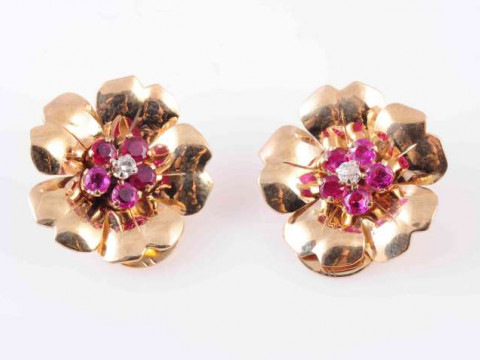 A PAIR OF RUBY AND DIAMOND CLIPS, set the centre with a single brilliant...