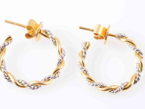 A PAIR OF TWO TONE GOLD COLOURED EARRINGS, of hoop design, with entwined...