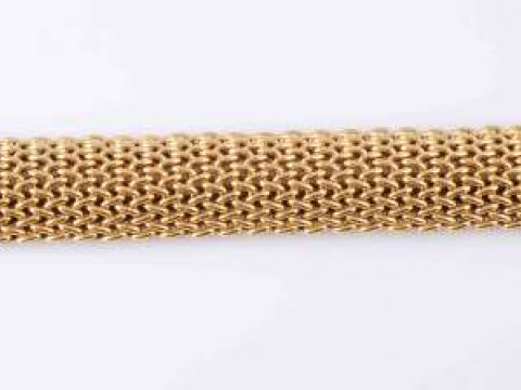 AN 18 CARAT GOLD BRACELET, the slightly domed bracelet of cross link design,...