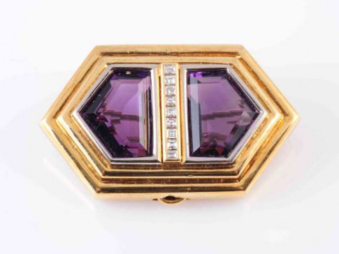AN AMETHYST AND DIAMOND BROOCH, CIRCA 1950-1960, the two fancy cut amethysts...