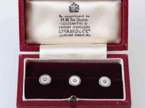 GARRARD & CO, A SET OF THREE MOTHER OF PEARL, DIAMOND AND WHITE GOLD COLLAR...