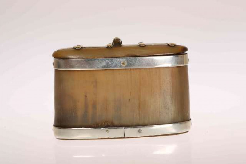 A SCOTTISH HORN SNUFF, oval with white metal mounts. 7cm high
