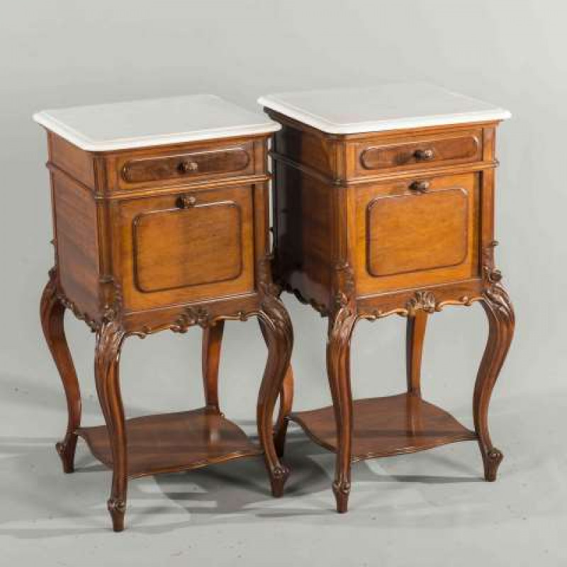 A PAIR OF 19TH CENTURY MAHOGANY AND MARBLE TOPPED POT CUPBOARDS, with moulded marble tops above a drawer over a cupboard with fall front, raised on cabriole legs joined by a shelf stretcher. 84.5cm by 43cm by 41cm