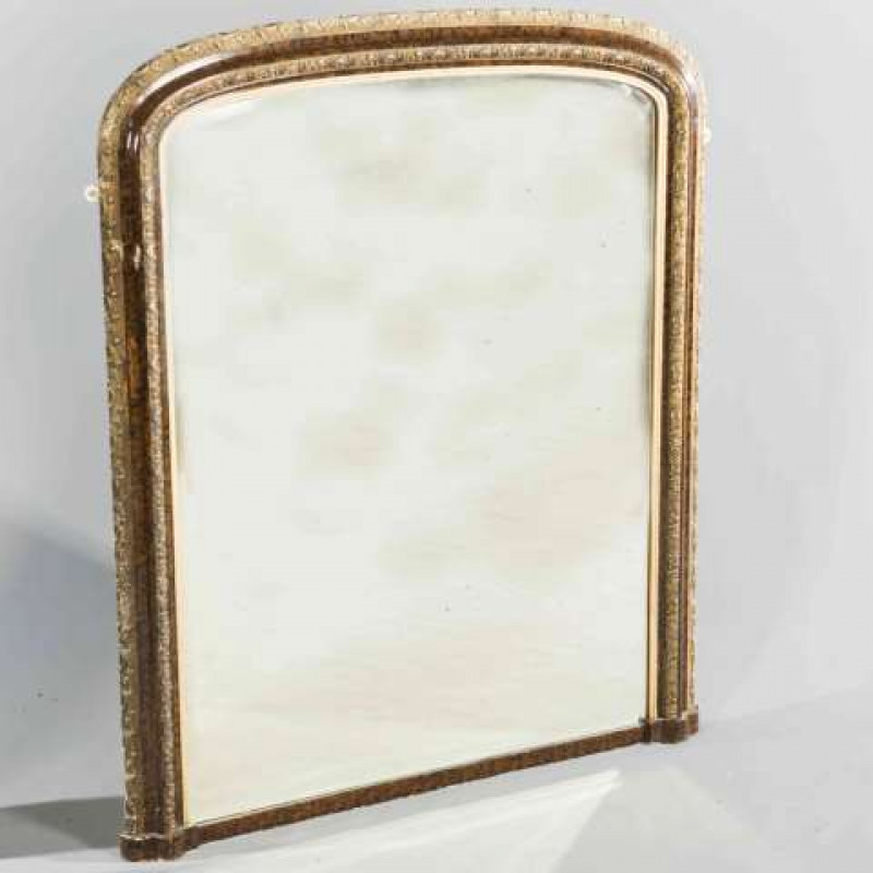A VICTORIAN GILT AND SIMULATED WALNUT OVERMANTEL MIRROR, with bevelled mirror plate. 118cm by 99cm