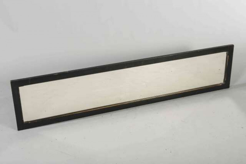 AN AESTHETIC EBONISED MIRROR, rectangular. 156cm by 34cm