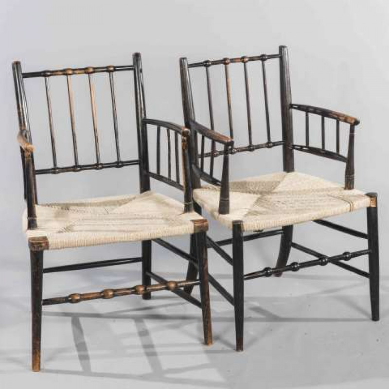 MANNER OF MORRIS & CO, A PAIR OF STAINED BEECH SUSSEX CHAIRS, of characteristic form with rush seats.