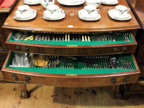 Walnut Queen Anne style table canteen of cutlery having two well stocked...