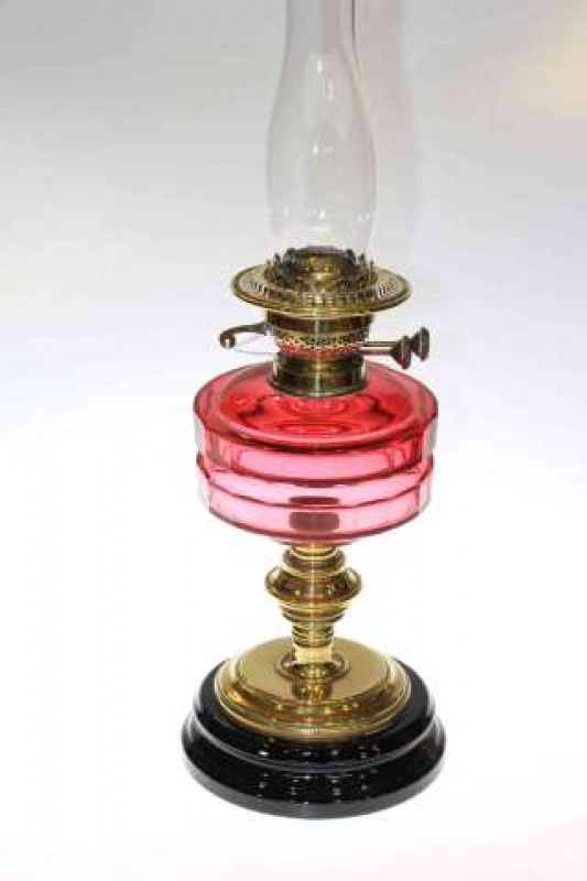 Victorian brass oil lamp with ruby reservoir